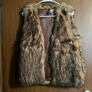 Woman’s fur vest.